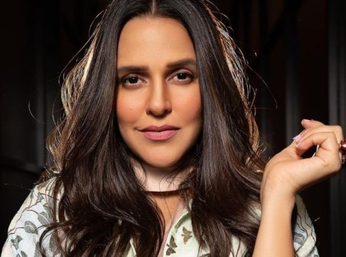 One Friday signs on Neha Dhupia